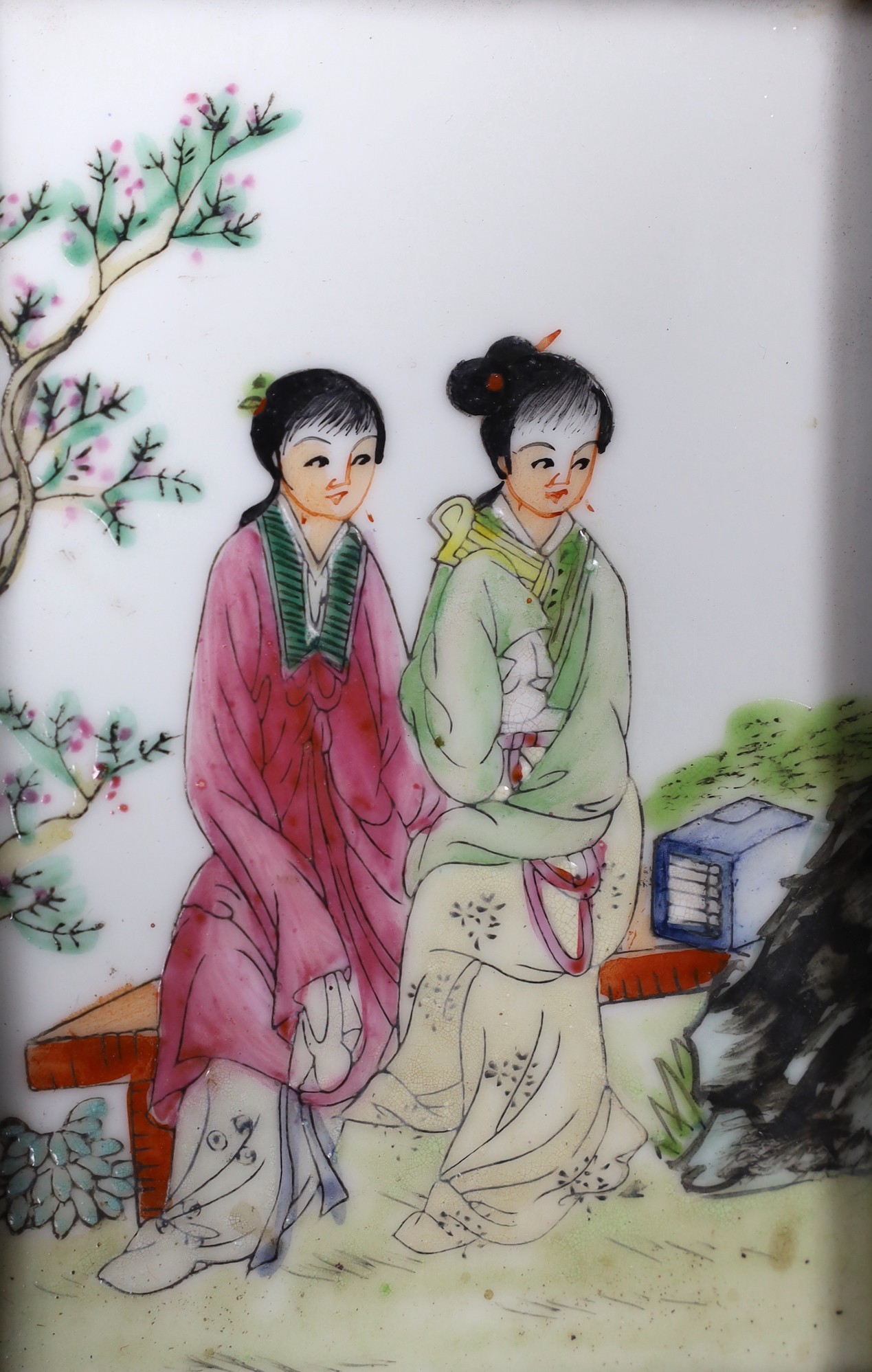 A Chinese famille rose plaque, framed, 13cms high x 8.5cms wide